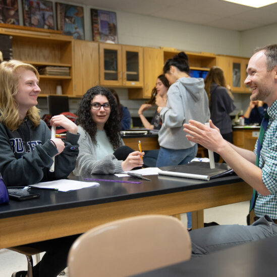 Jordan Pasqualin discussing lesson in classroom at Knowles Teacher Initiative